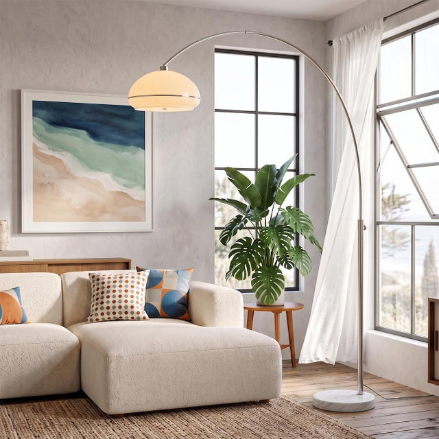 The Morelli Arc Lamp is a Modern arc lamp with a Satin Nickel steel frame, designed by Peter Morelli in 1960. This elegant...