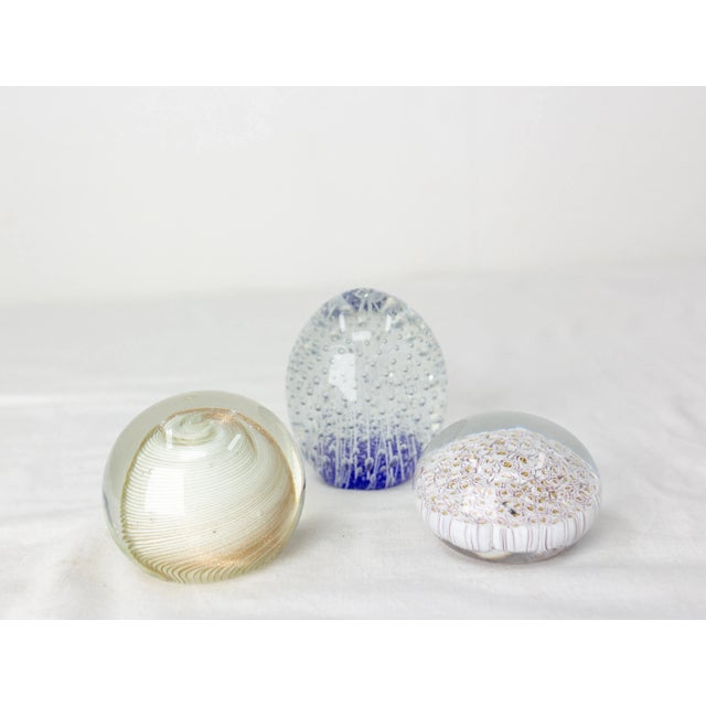 1960s set of three paperweights from Murano Venici Italian Murano glass Dimensions of each paperweight: Blue paperweight:...
