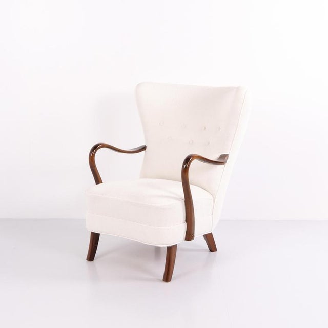 High-back armchair model 23b designed by alfred christensen and manufactured by slagelse møbelfabrik in the 1940s. Crafted...