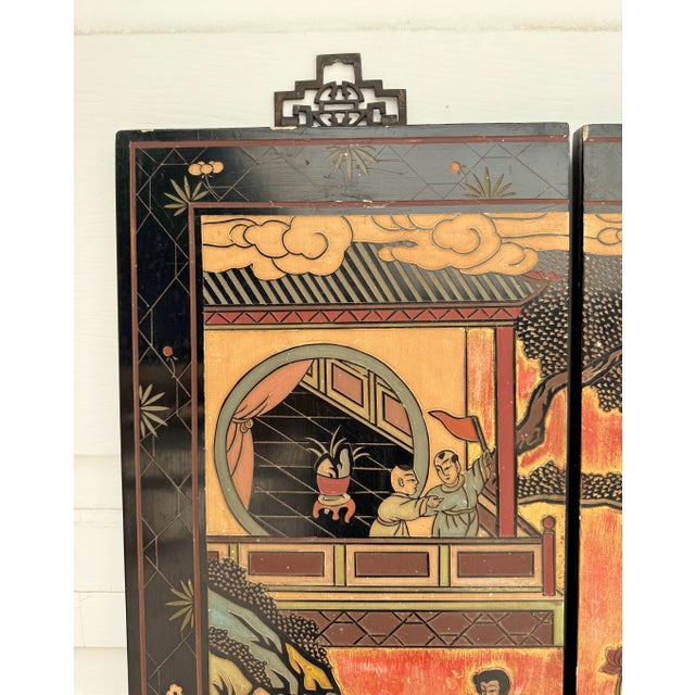 Here is a fantastic mid-century Chinese set of four decorative lacquer wall panels, designed to hang together to create...