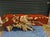 Offering for sale this Phillips Collection freeform console table featuring gold leaf and faux bois. Here are some...