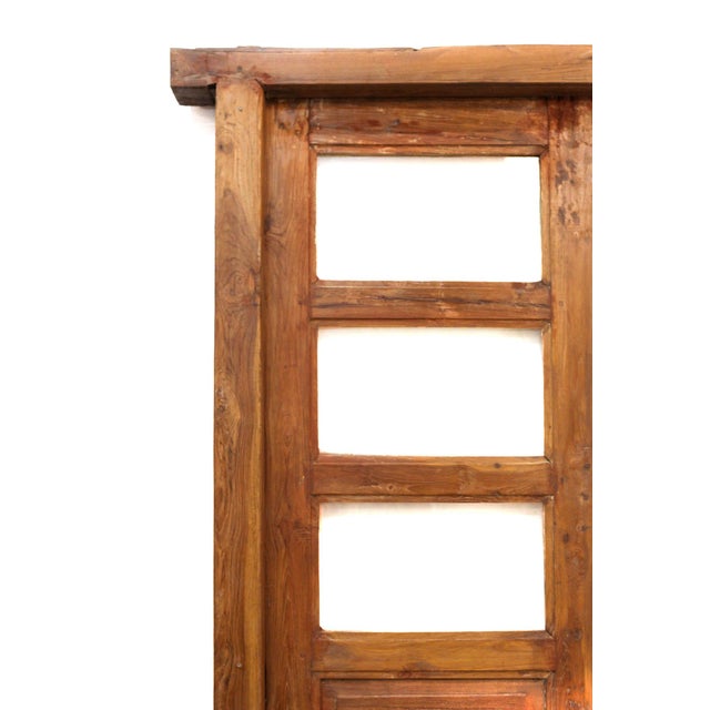 Our teak door is a unique one-of-a-kind piece. Handcrafted double door in original frame. This is an amazing door with...