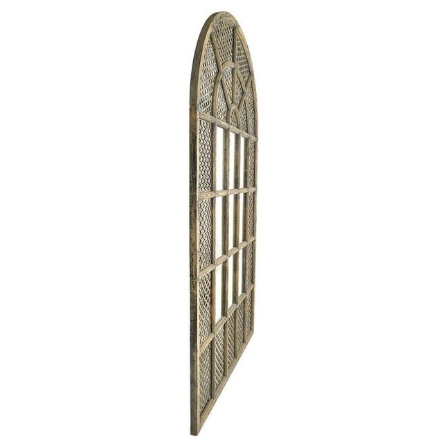 This large wall mirror is a unique piece, made from an old carved wooden claustra, carefully transformed by our craftsmen....