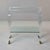 This Italian two-tier table is constructed in clear Lucite, raised on four square-section legs that taper toward the foot....
