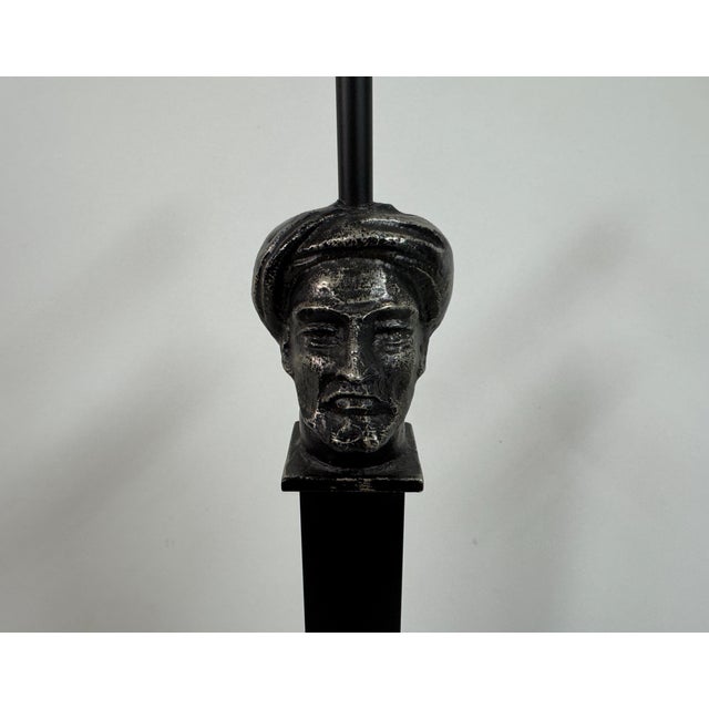 A striking pair of sculptural metal floor lamps designed by Aimé Cécil for Les Héritiers. Each lamp is composed of a tall,...