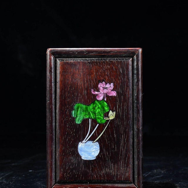 This beautifully crafted box is a fine example of traditional Chinese mixed-media artistry. Unlike standard hinged boxes,...