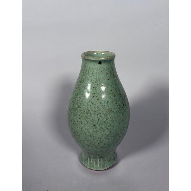 Celadon stoneware vase, Longquan period, Yuan-Ming Dynasty. Incised under the celadon glaze with a geometric motif. No...