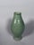 Celadon stoneware vase, Longquan period, Yuan-Ming Dynasty. Incised under the celadon glaze with a geometric motif. No...