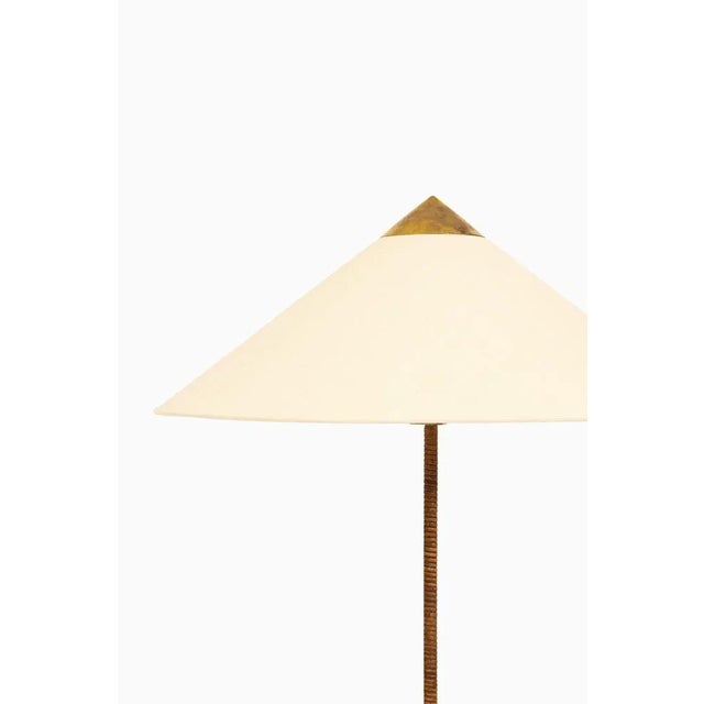 Floor lamp in brass and cane by paavo tynell, 1950's additional information: material: brass and cane style: mid century,...
