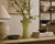 An exceptional mid-century art glass vessel distinguished by its architectural silhouette and richly textured...