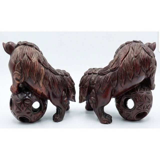 Asian Mid 20th Century Pair of Chinese Carved Hardwood Foo Dogs For Sale - Image 3 of 5