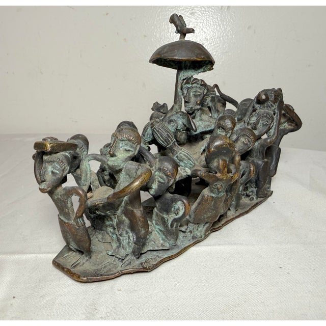 The antique 19th century Ashanti King from Ghana detailed figural bronze statue is an original piece showcasing intricate...