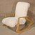 Mid-century modern style rocking chair in the design of Vladimir Kagan. Great form throughout the wrapping wood frame,...