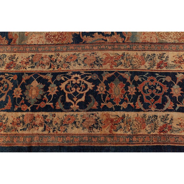 This exquisite Oversized Antique Persian Bidjar Rug, woven circa 1880, is a striking testament to the artistic depth and...