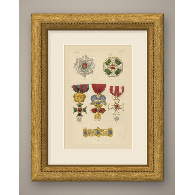An original antique wood engraving, colored by hand with watercolor, showing eight insignia of austria. At the upper left...