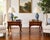 An elegant pair of mahogany lamp tables by Councill Craftsmen, showcasing the exceptional quality and traditional styling...