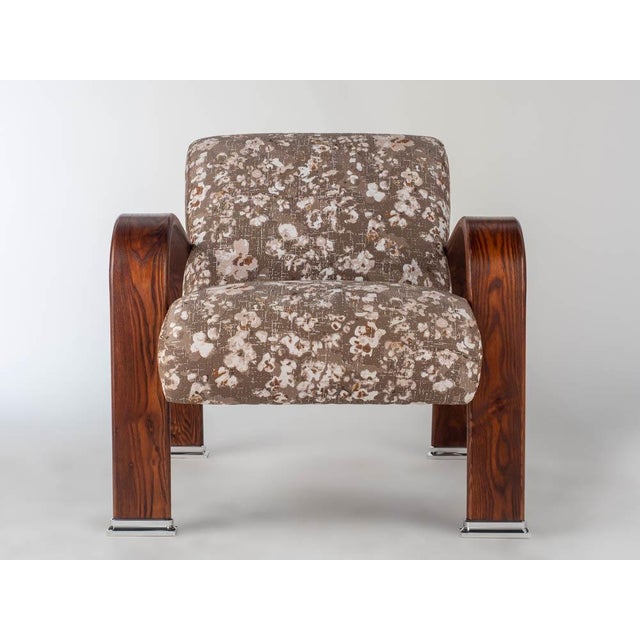 Steam bent solid Ash arms, polished aluminum machined feet, solid maple double doweled seat & back frame with Sinuous...