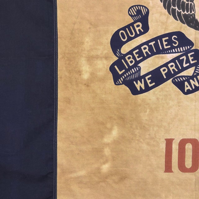 This vintage Iowa state flag is made from a cotton cloth with sewn panels, and printed emblem visible on both sides....