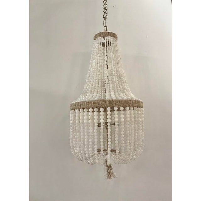 Stylish Ro Sham Beaux Malibu Up Chandelier. Beaded chandelier with wrapped rope frame. Original Retail $3807. Showroom...