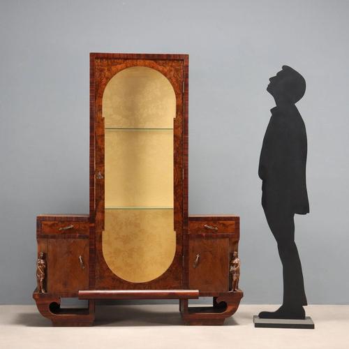 Vintage display cabinet with wooden storage compartments featuring walnut veneer, exotic wood accents, and a burl front....