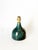 The lampshade is not included. Elegant French table lamp featuring a bottle-shaped ceramic base finished in a rich deep...