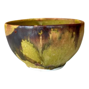 Ceramic Tea Bowl with Mottled Yellow Glaze by Toshiko Takaezu