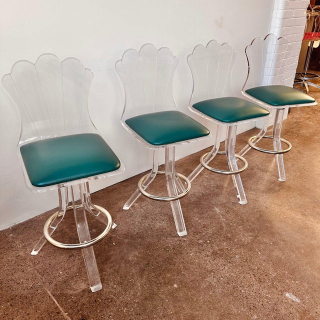 Art deco revival style fantastic and rare set of four lucite or acrylic 3 legged swivel bar stools (counter height) with...