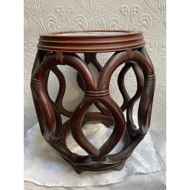 This is truly a one of the kind handmade Antique Bentwood Chinese table that would highlight any decor!