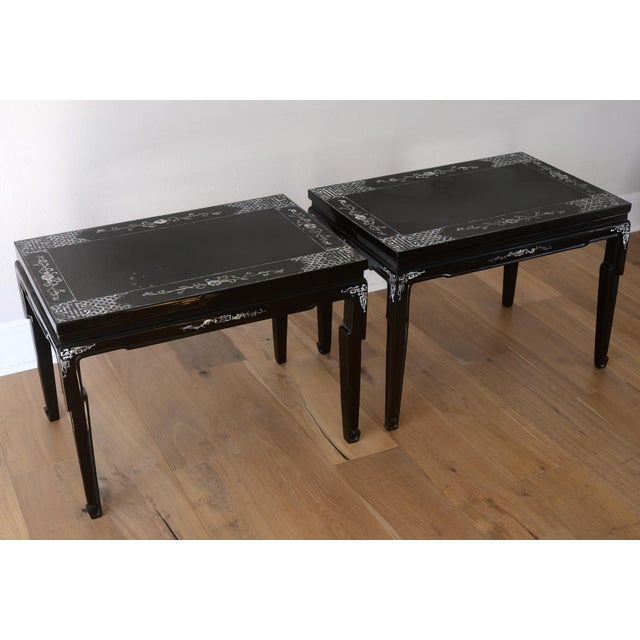 A very rare and special pair of vintage hand-made Vietnamese black lacquer and mother of pearl side tables from the 1960s....