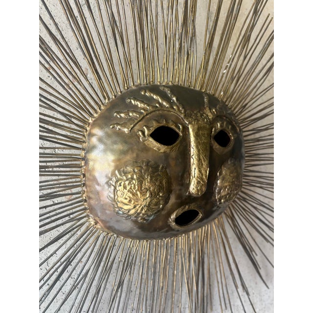 A monumental 1970s Brutalist sun face wall sculpture by Emaus, crafted in Mexico by the Benedictine Monks of Cuernavaca...