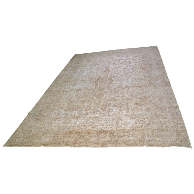 Hand-knotted with care using traditional rug-making techniques, this wool rug blends timeless craftsmanship with a modern...