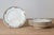 Four French Sarreguemines asparagus plates from the late 19th century, with teal accents and shell-shaped hole for the...