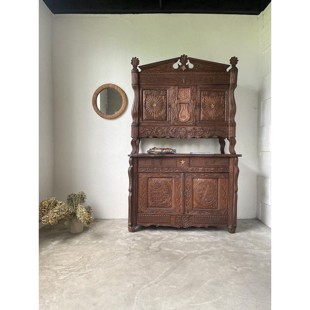 Very old and atypical piece of furniture from auvergne in brutalist or popular art style. entirely in solid oak, composed...