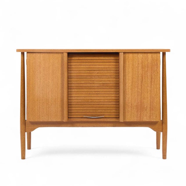 John Keal for Brown Saltman Mid Century Bleached Mahogany Tambour Door Credenza This credenza measures: 44.25 wide x 18.25...