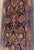 A beautiful and unusual antique Persian Mohajeran Sarouk rug, dating to approximately 1910, featuring an exceptionally...
