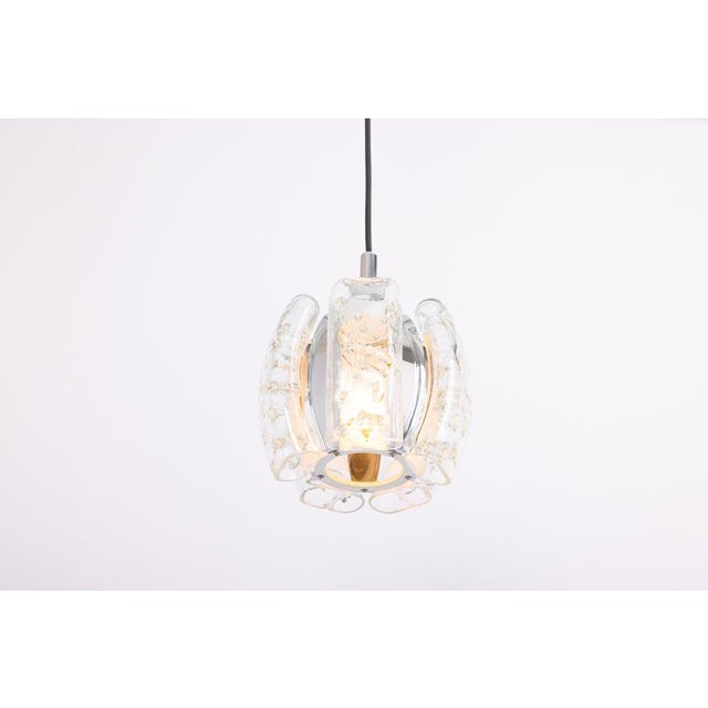 1 of 5 petite murano pendant lights designed by doria, 1970s very good condition. Cleaned, well-wired. Each pendant...