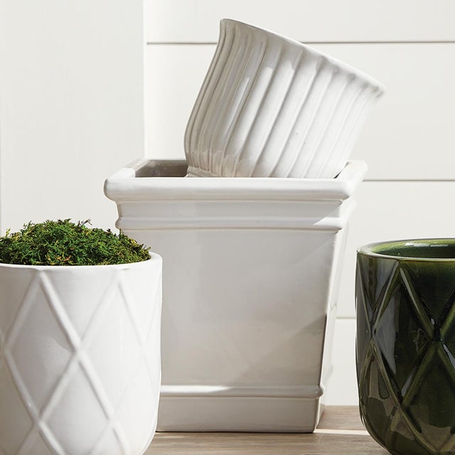 This set of earthenware pots are designed for the outdoors, but are equally as beautiful indoors. From the depth of the...