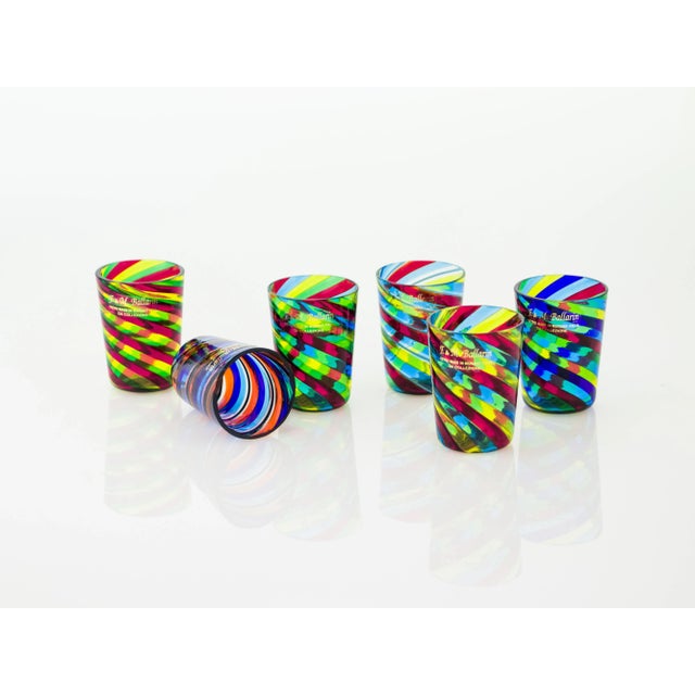 Set of 6 Murano glass "Filigrana" style hand blown glasses. Product composed of colored glass canes, put together and then...