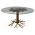 Striking and unique dining tabel in the manner of Duval brasseur with a hand made tree branch base. Made from aluminum and...