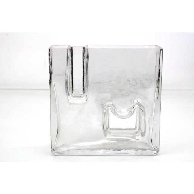 Vase is delivered together with the glass advertising display from Riedel. This piece has an attribution mark, I am sure...