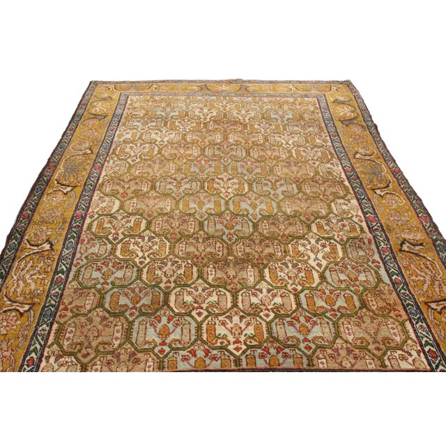 Hailing from 1890 with possible origins in Israel and Syria, this antique Jerusalem wool rug depicts a fine series of...
