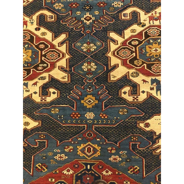 Beautiful Shirwan Kuba of the Zeijwa type, decorated with two large blue medallions that detach from the white background...