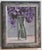 Oil painting of a vase of Lilacs painted in a textured impressionist style on a gray interior background, and framed in a...