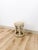 This charming vintage lightwash rattan stool with woven wicker seat is a beautifully crafted coastal and Hollywood Regency...