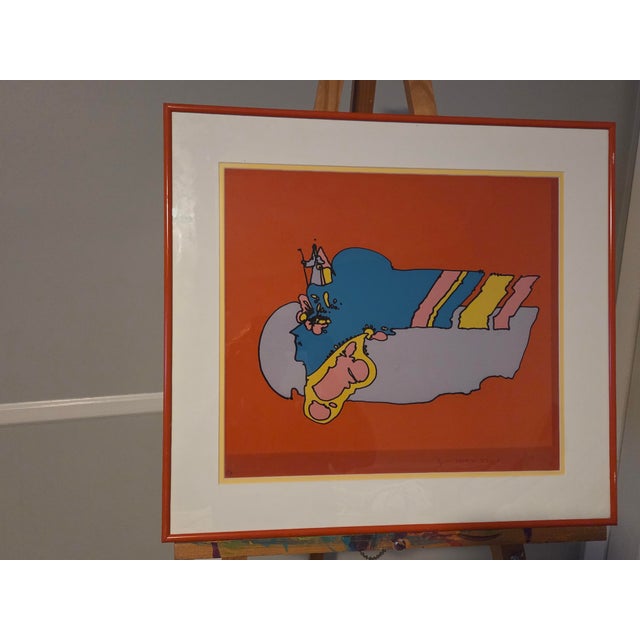 Pristine, museum quality Peter Max print of "Remembering the Flight." This was purchased in 1977, matted and framed in a...