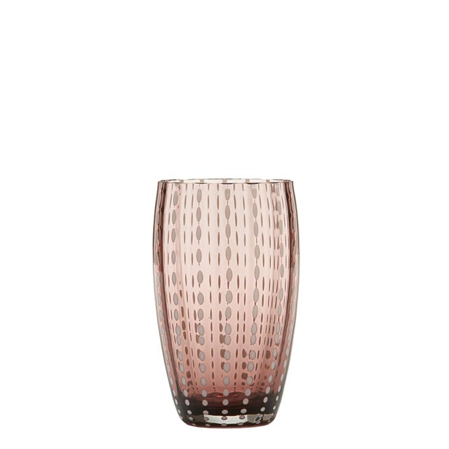 Collection for the table in clear colored glass. It includes tumblers for water and soft drinks, wine glasses, flute...