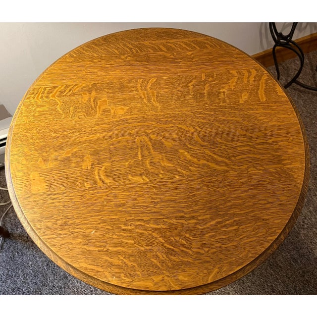 Antique Oak Parlor Stand. There is a lower shelf, as shown in pictures. Dimensions: W: 24" x D: 24" x H: 30"