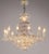Beautiful art deco revival crystal chandelier with twelve lights/arms. Half basket lower section is reflected in a...