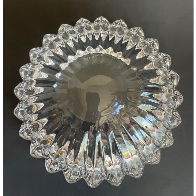This elegant vintage Tiffany & Co. crystal candy dish features a beautifully sculptural form with deeply fluted sides and...