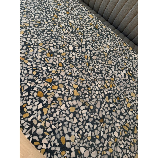 This one of a kind tabletop was custom made by Concrete Collaborative, a handmade terrazzo piece in a stunning blend of...